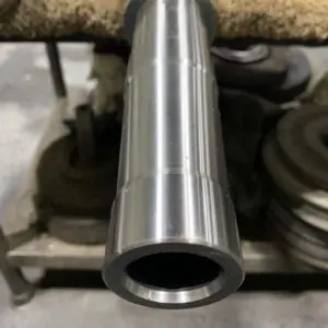 Precision Machined Ram — Astro Tool & Machine Co. Precision machined and polished ram shaft with hollow bore, remanufactured by Astro Tool & Machine Co.