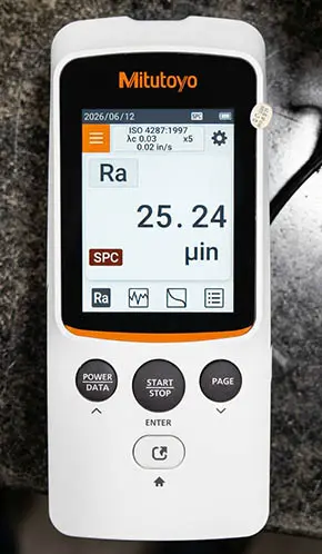 Precision Inspection with Digital Roughness Gauge — Astro Tool & Machine Co. Mitutoyo digital surface roughness gauge used for precision inspection at Astro Tool & Machine Co.